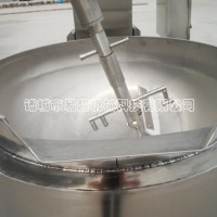 大型行星攪拌醬料炒鍋，自動加熱無需人工攪拌。