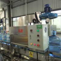 桶裝水熱縮膜機采用熱風方式低壓分配均勻